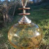 Vintage suspension ball in amber glass