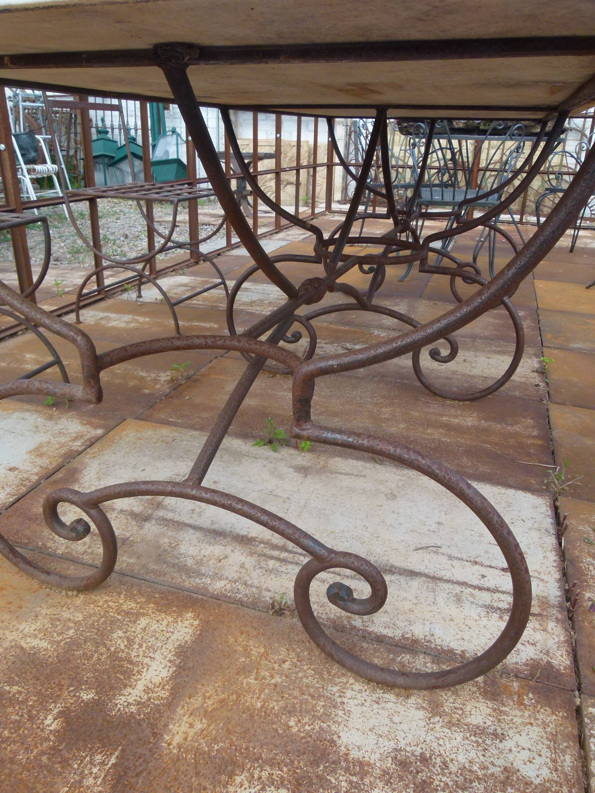 Marble table with wrought iron legs