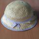 Women's boater-style straw hat