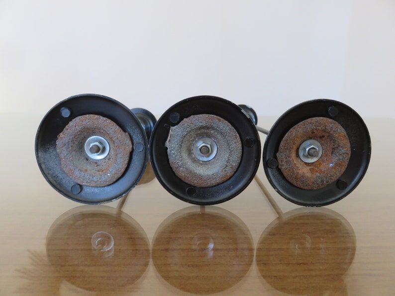 Series of 3 Scandinavian candle holders in black lacquered metal 60s 70s