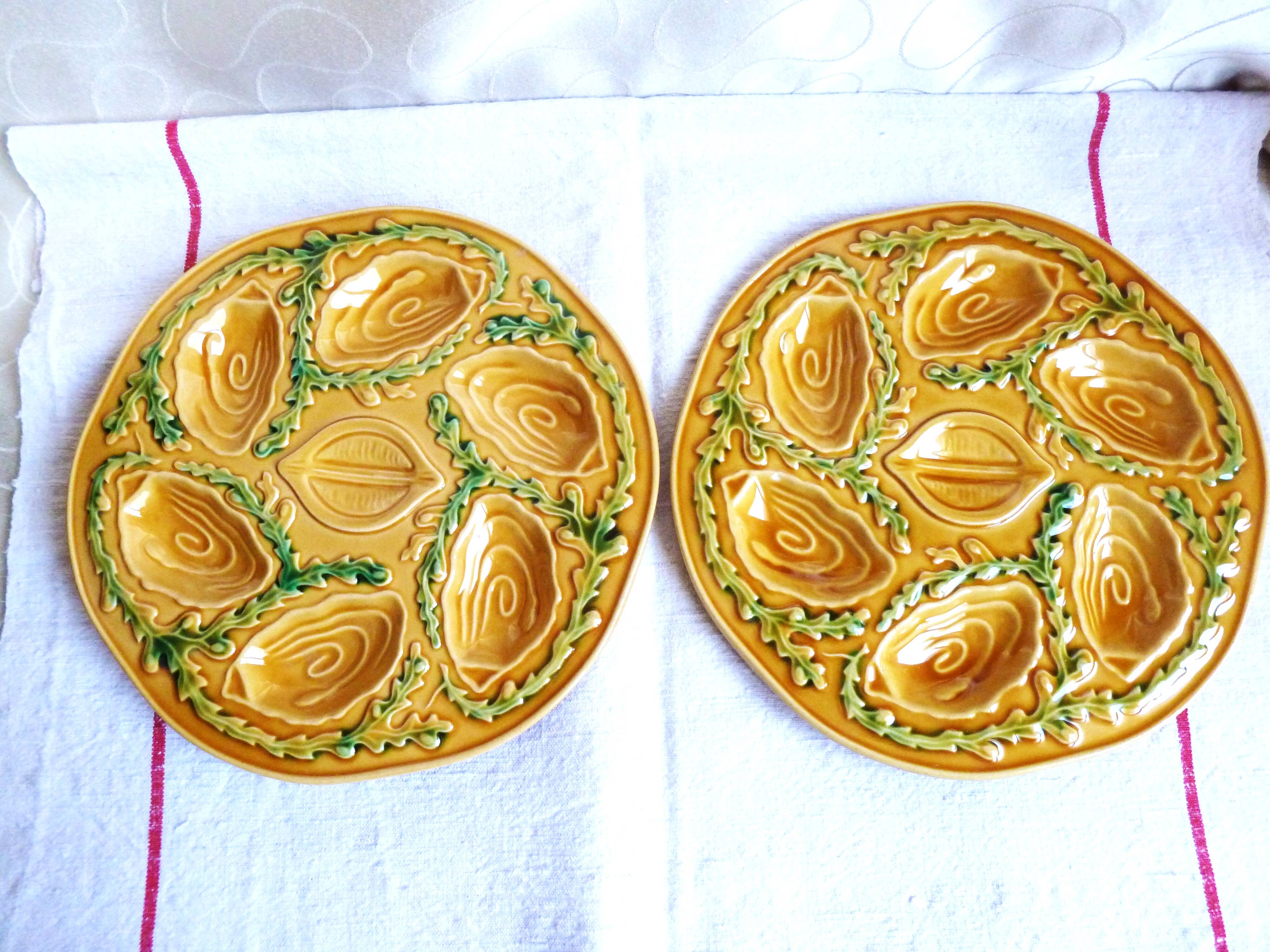 Oyster plates in slip, seafood plates, festive table.