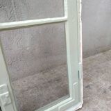 Old window mounted as a fenestron