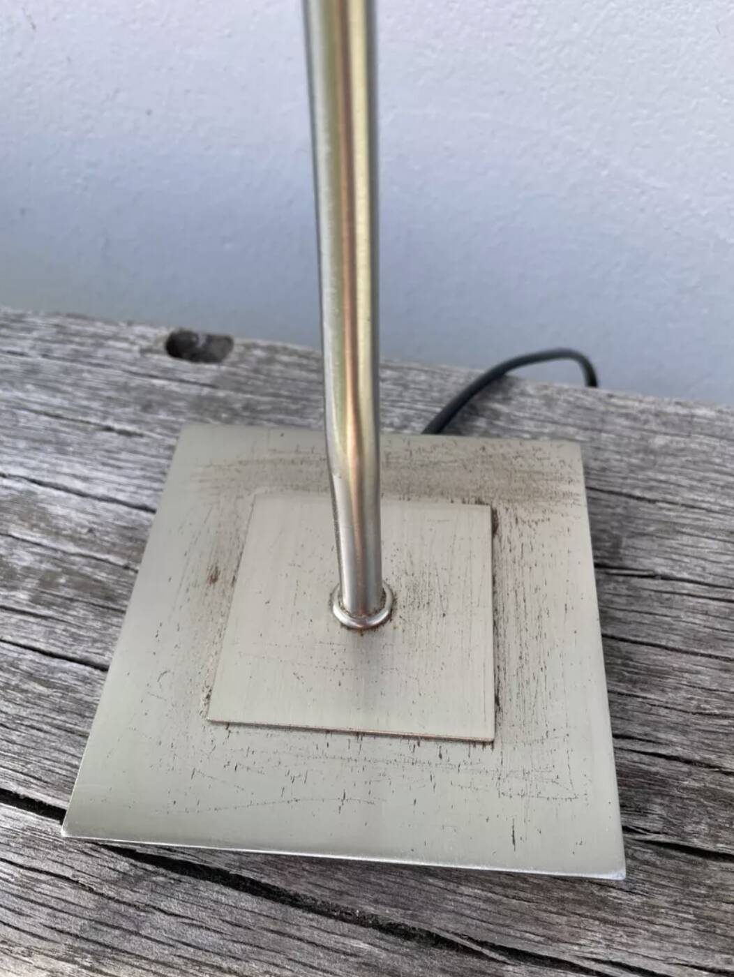 Pair of lamps with wavy metal base and blue lampshade 2000