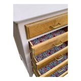 Vintage powder pink compass leg chest of drawers from the 1950s