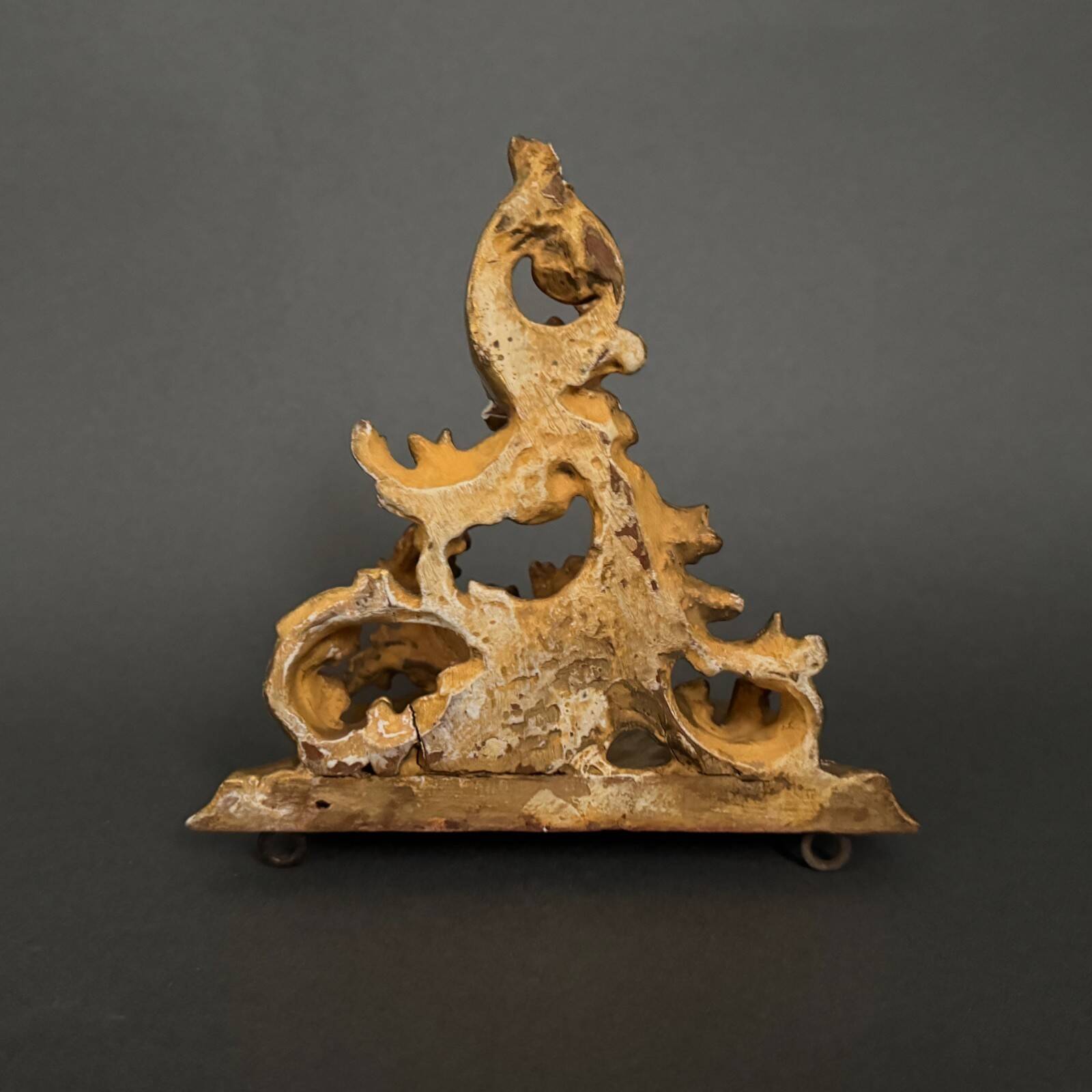 Set of three gilded wood consoles in Rococo style, late 19th century.
