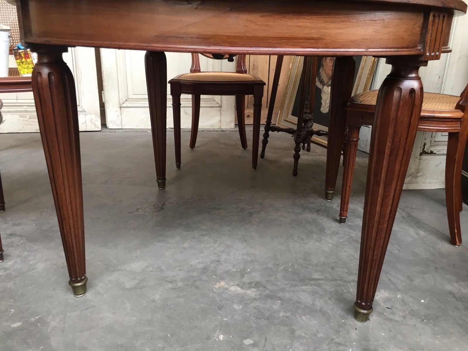 Table and six chairs in the Louis XVI style mahogany