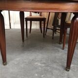 Table and six chairs in the Louis XVI style mahogany