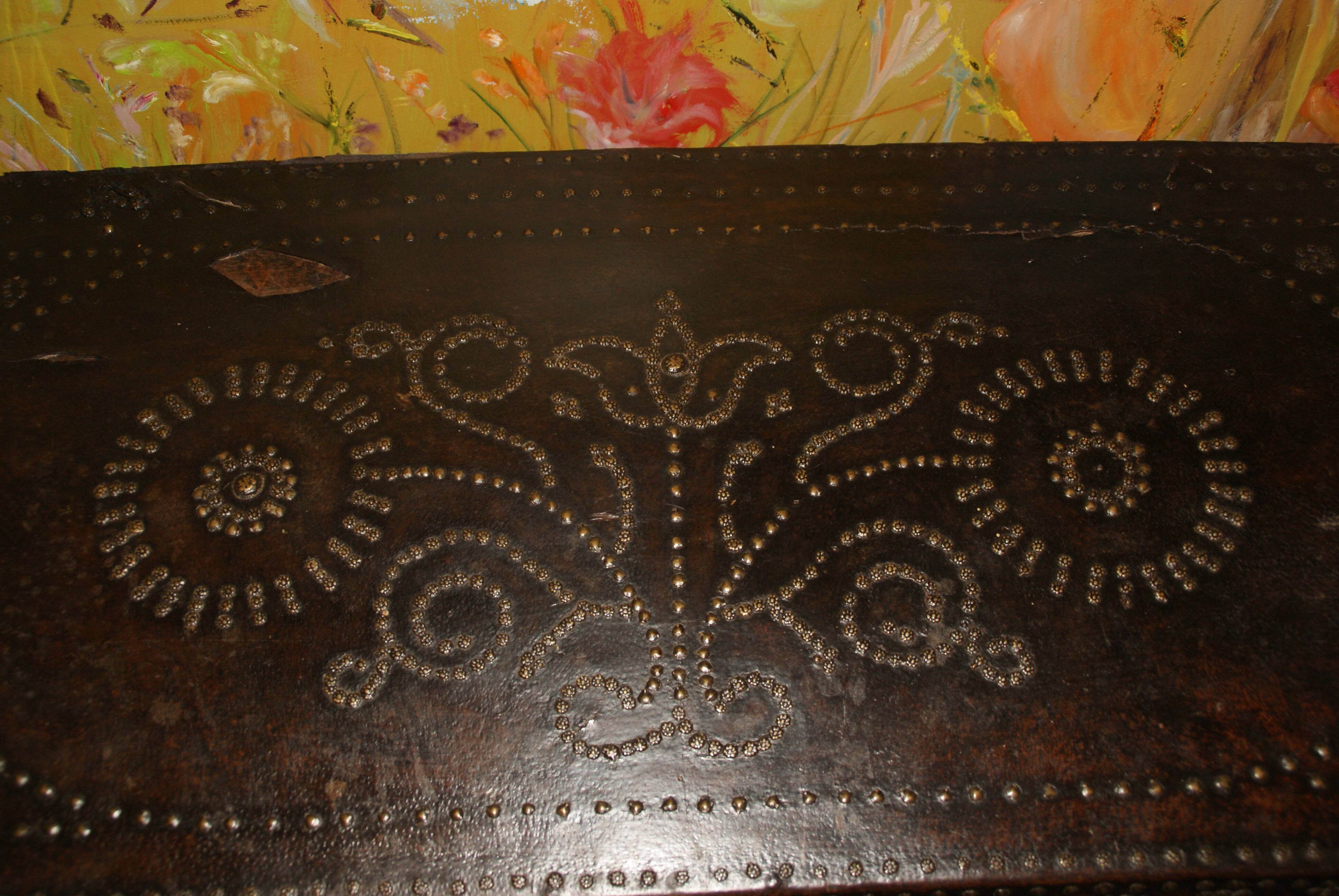 17th century studded leather travel trunk, richly decorated