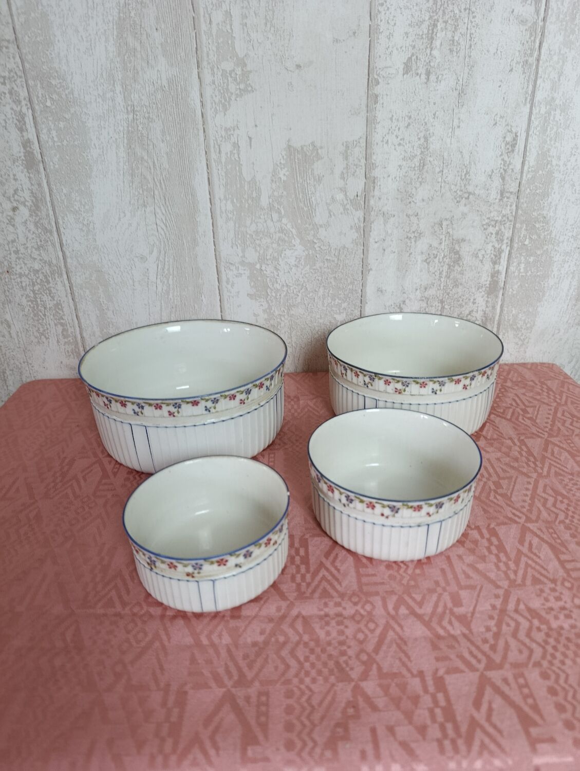 Nested porcelain salad bowls decorated