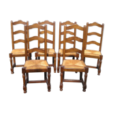 Set of 6 oak dining chairs with high backs and straw seats