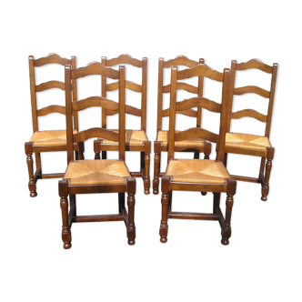 Set of 6 oak dining chairs with high backs and straw seats