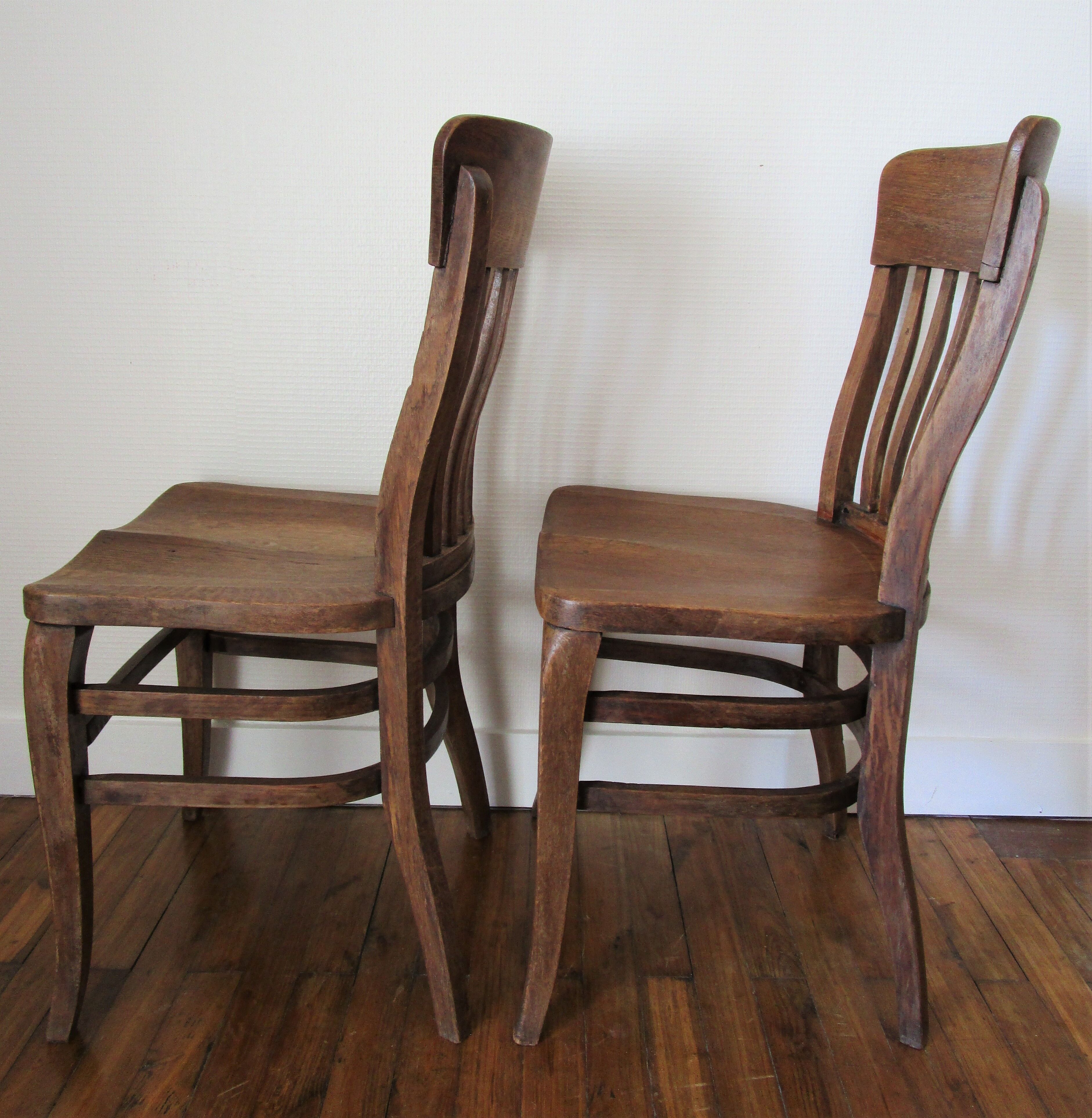 Two chairs solid oak patinated early twentieth century