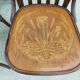 4 bentwood bistro chairs with a pattern on the seat