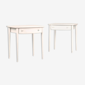 Pair of white lacquered bedside tables