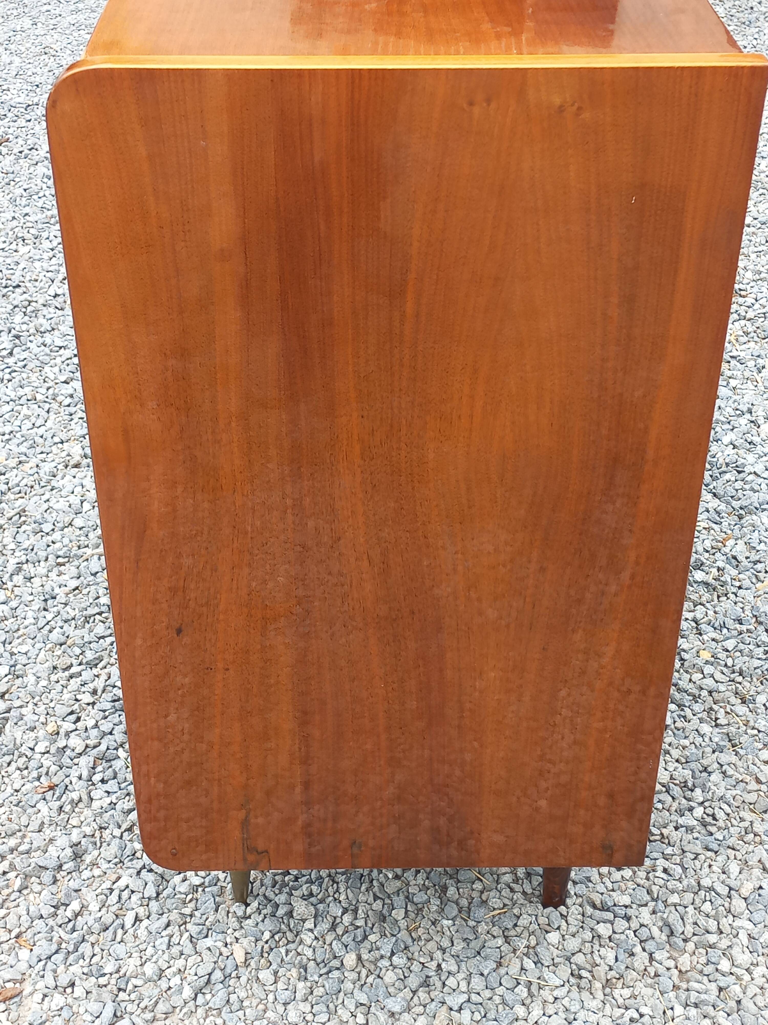 Vintage walnut varnished chest of drawers with 4 drawers from the 1960s.