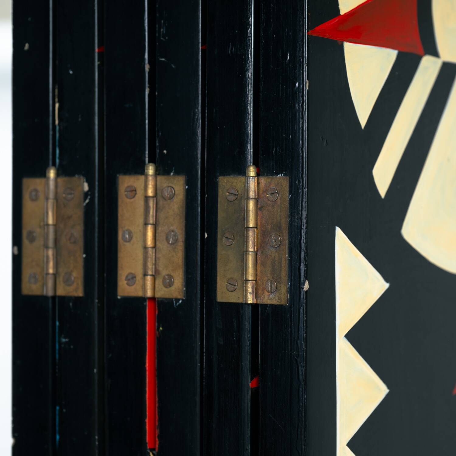 Room divider in art deco style with birds, geometric patterns, red, yellow, blue