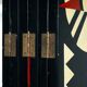Room divider in art deco style with birds, geometric patterns, red, yellow, blue