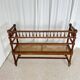 Antique banquette in Louis XIII style, turned wood with caning, late 19th to early 20th century.