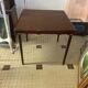 Table de jeu en bois avec pieds pliables