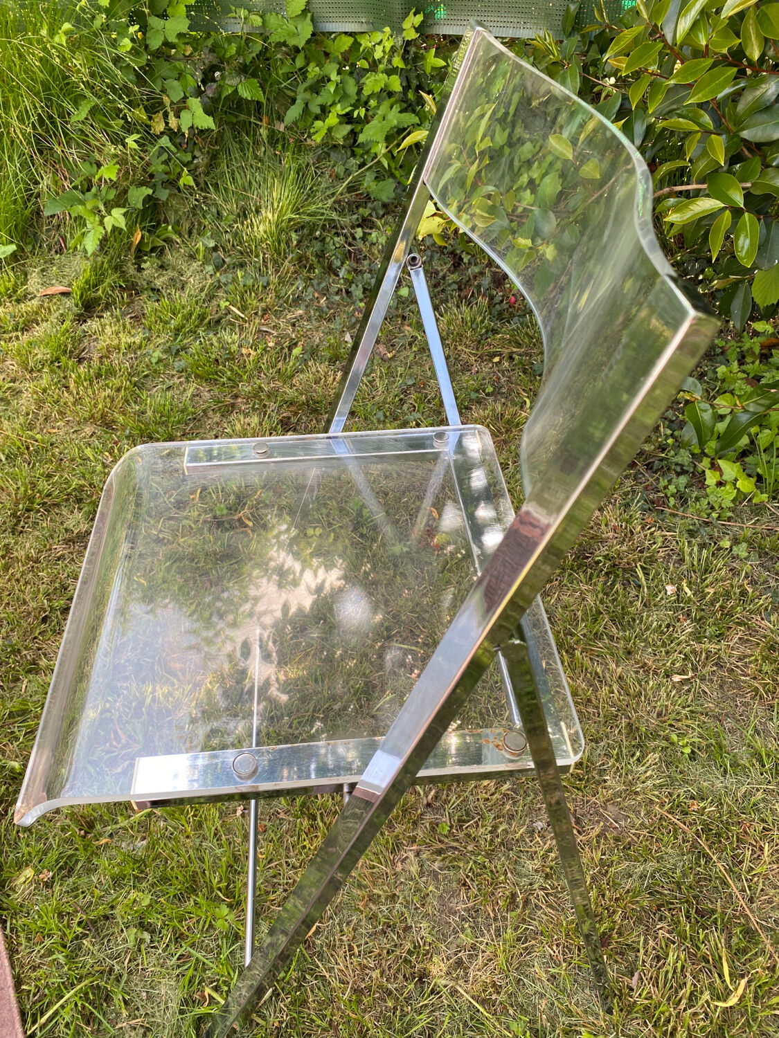 Folding plexiglass chairs