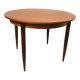 Vintage 1970s round table with extensions.