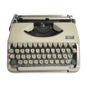 Old typewriter 4 stars metal beige + trunk portable vintage