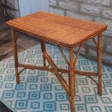 Table with bamboo legs and rattan top