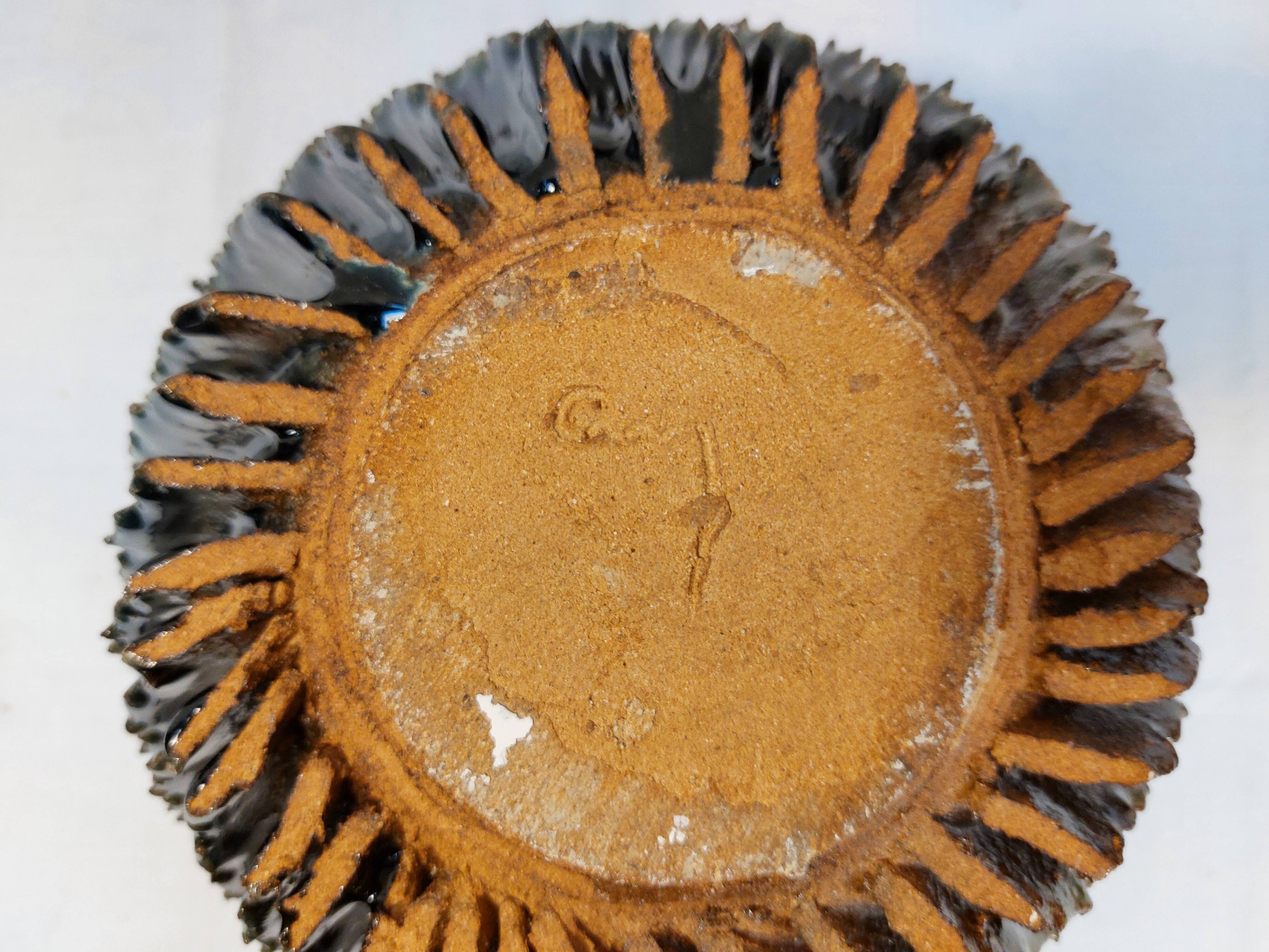 vase boule à ailettes torsadées