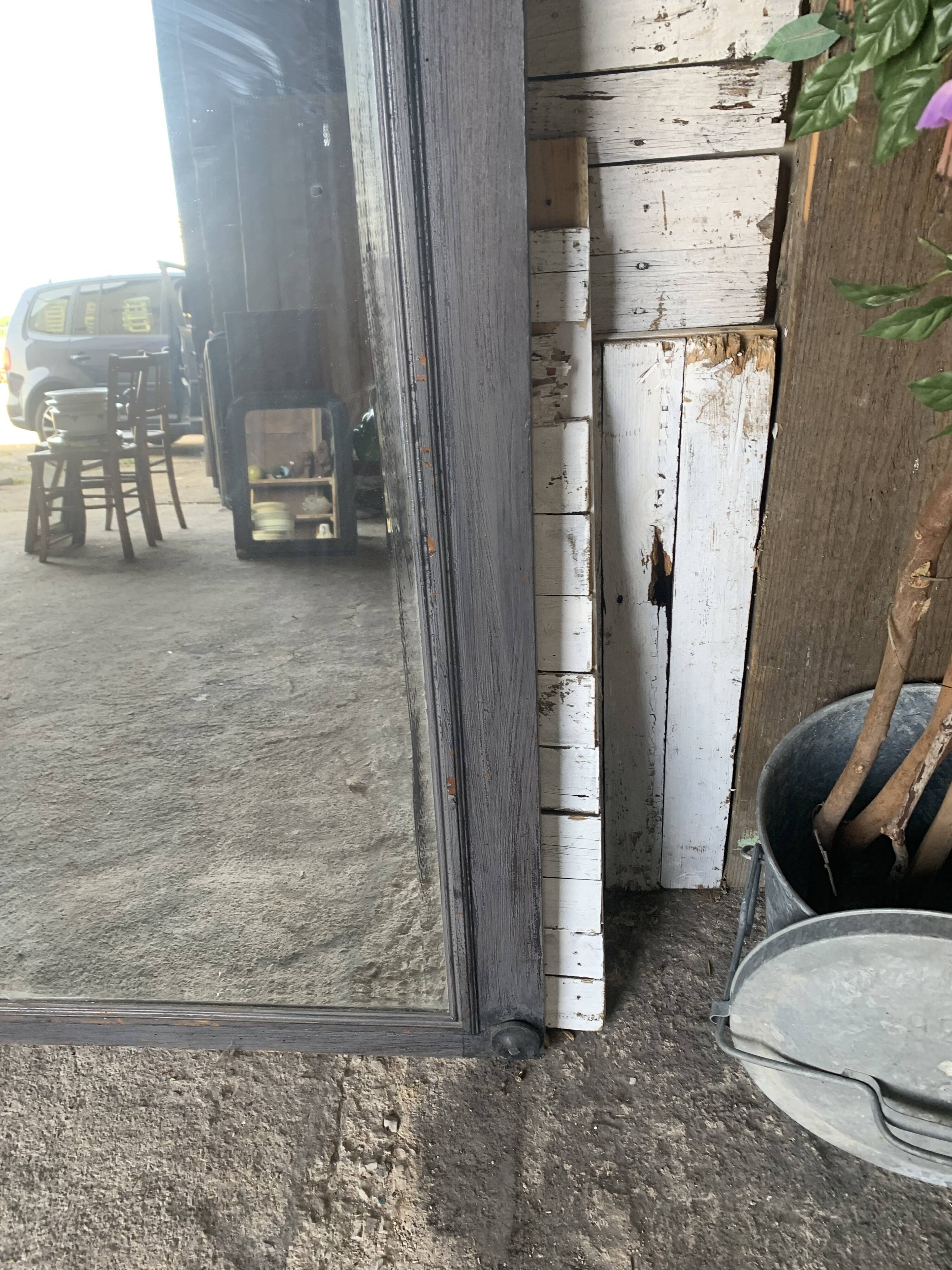 Wooden mirror with juice patina