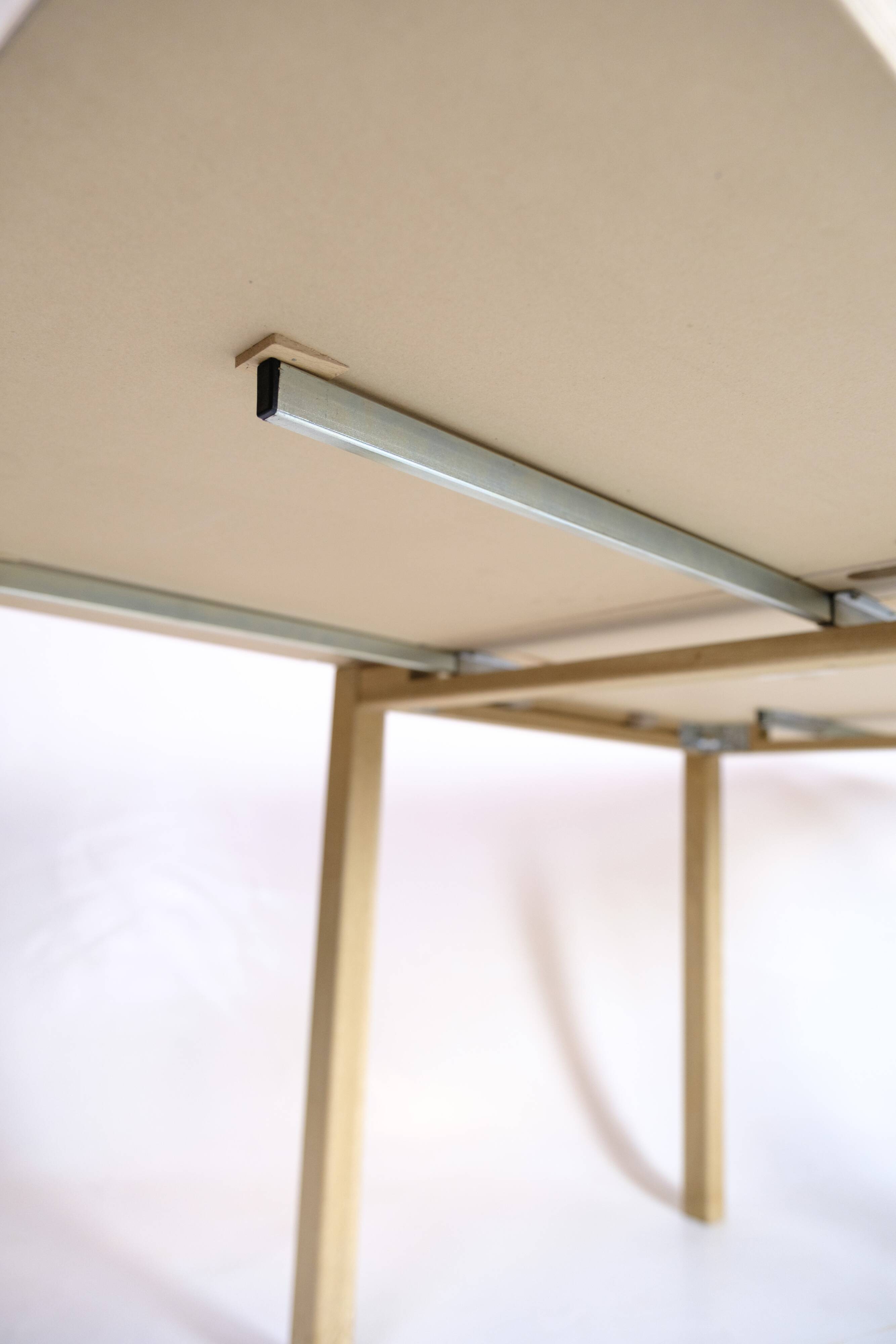 Table with drop leaves - Model 517 - White laminate top - Oak - Haslev Møbelsnedkeri