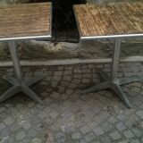 Two vintage bistro tables