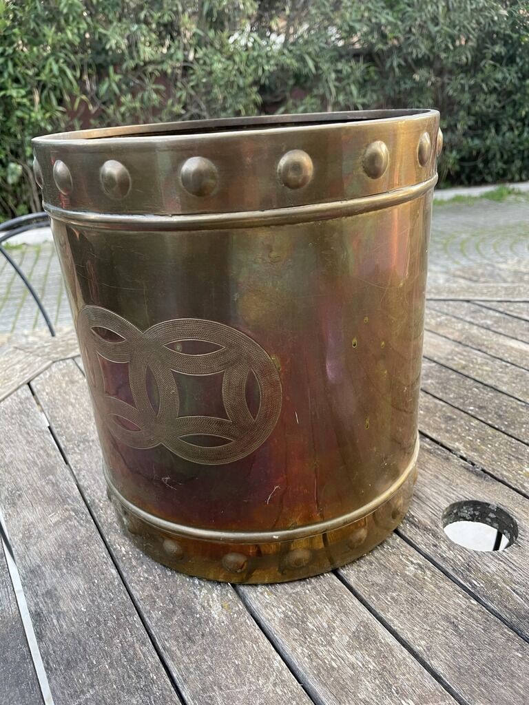 Brass pot cover