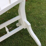 White wooden bercelonnette