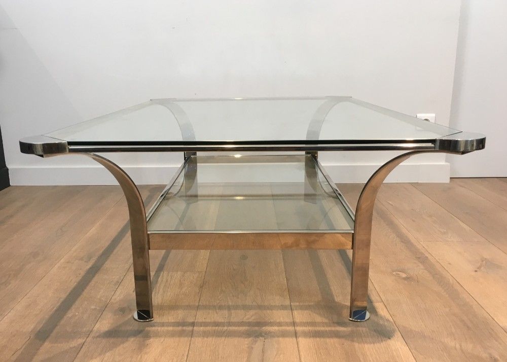 Large designer coffee table in chrome with glass tops