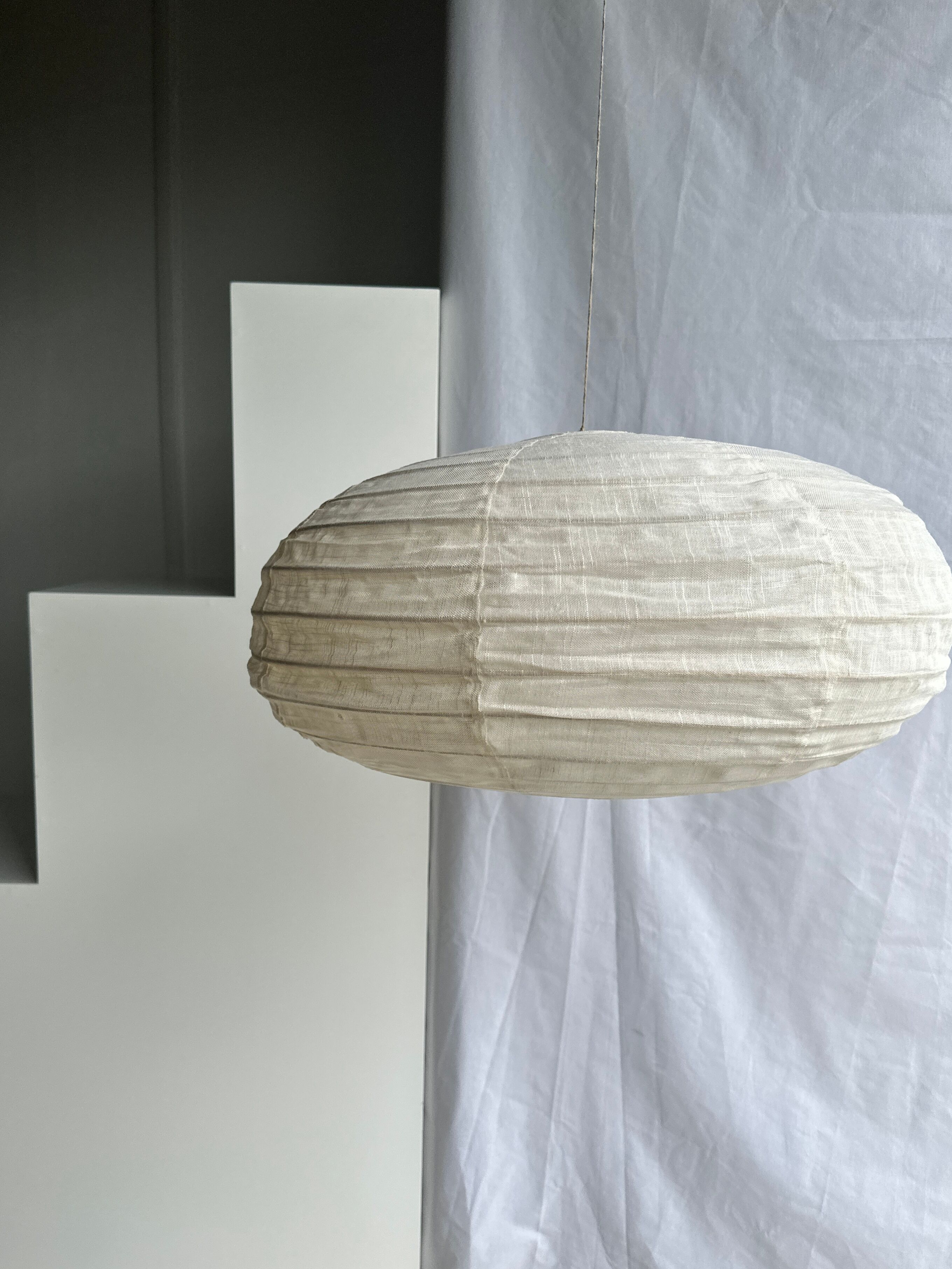 Suspension in rattan and natural linen Japanese style flattened oval h35 d60