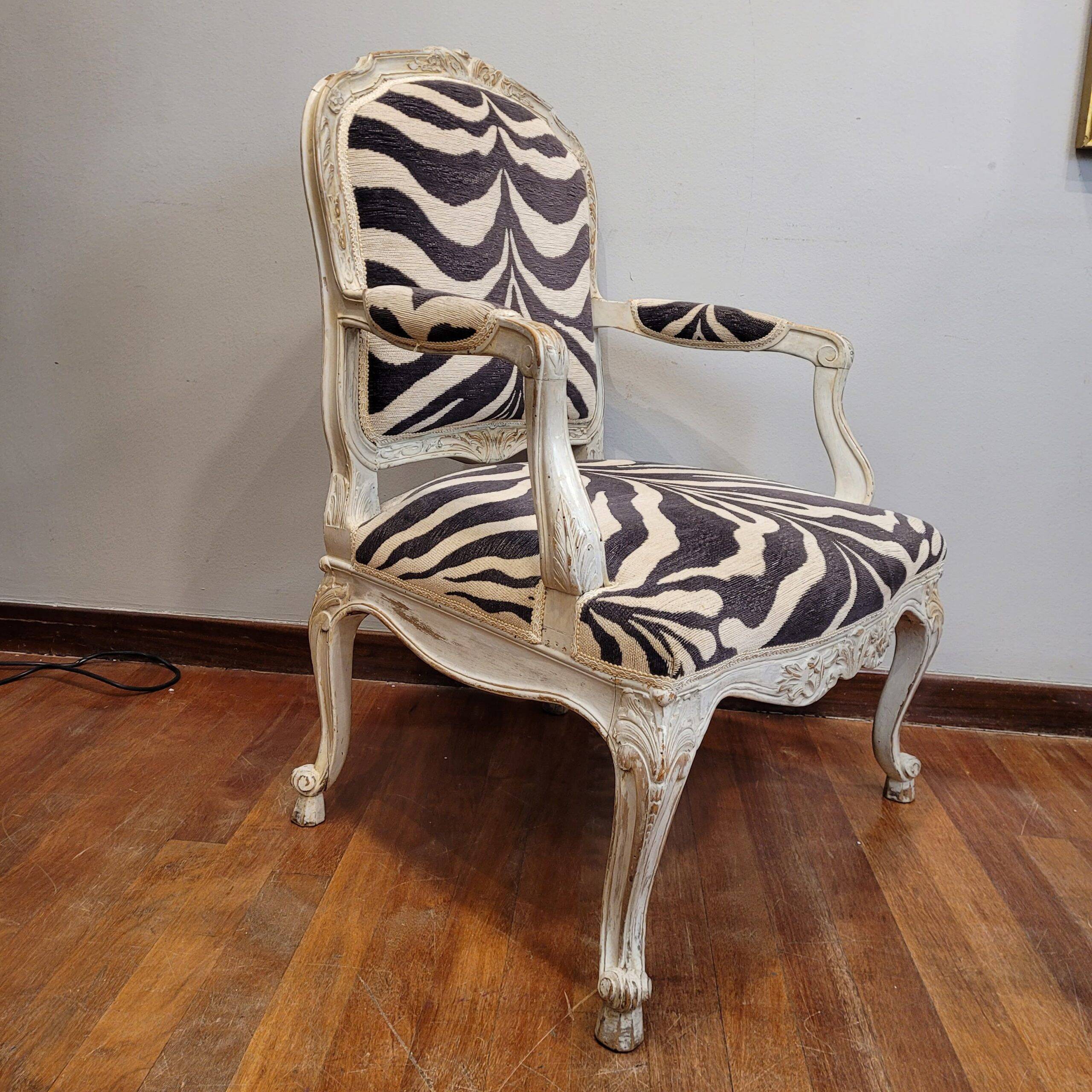 Pair of armchairs, carved and polychrome wood, printed zebra tapestry, Louis XV, circa 1790 – France