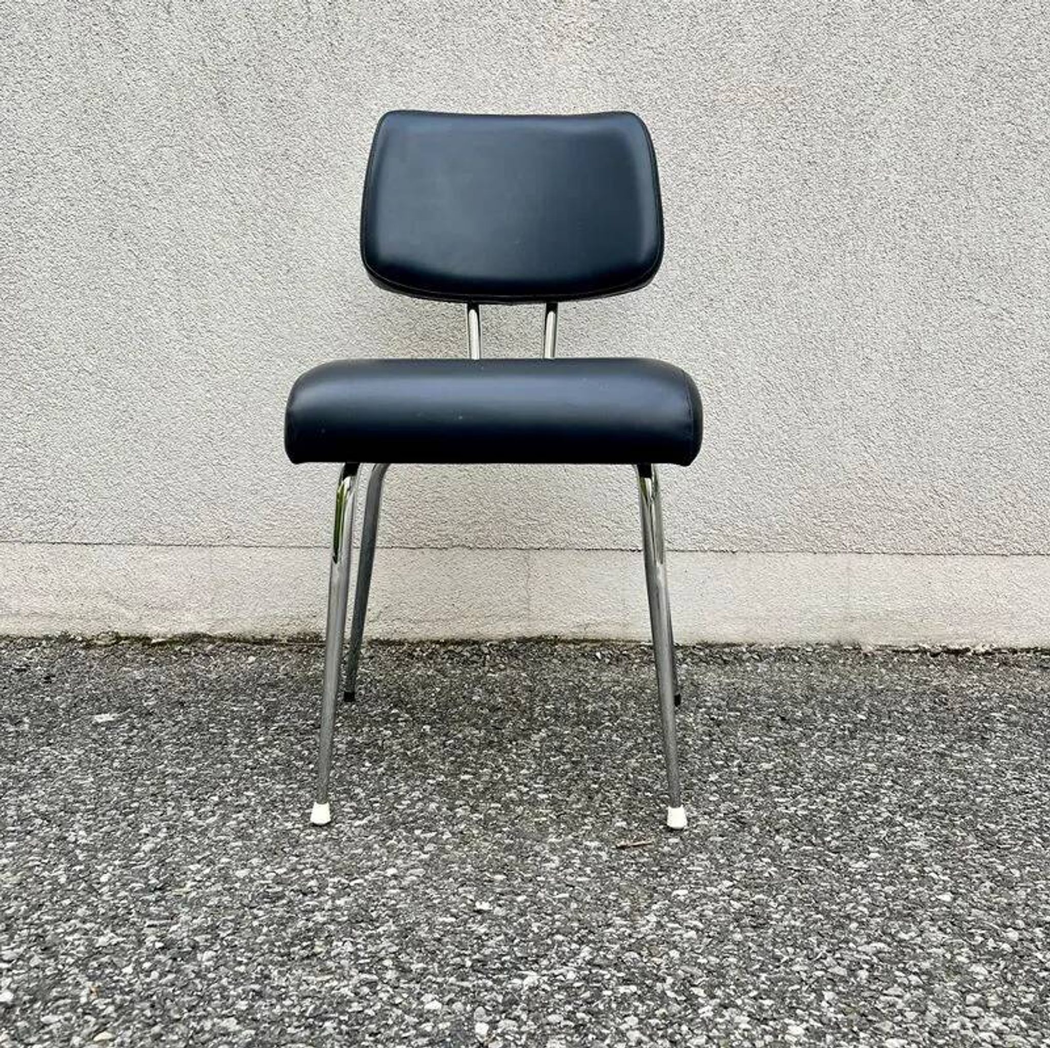 Black faux leather office chair