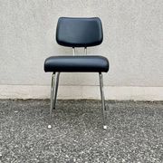 Black faux leather office chair