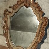 Miroir ancien doré en flammes style Louis XV
