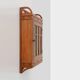 Art Deco oak wall cabinet with amber glazed door, Belgium ca. 1925