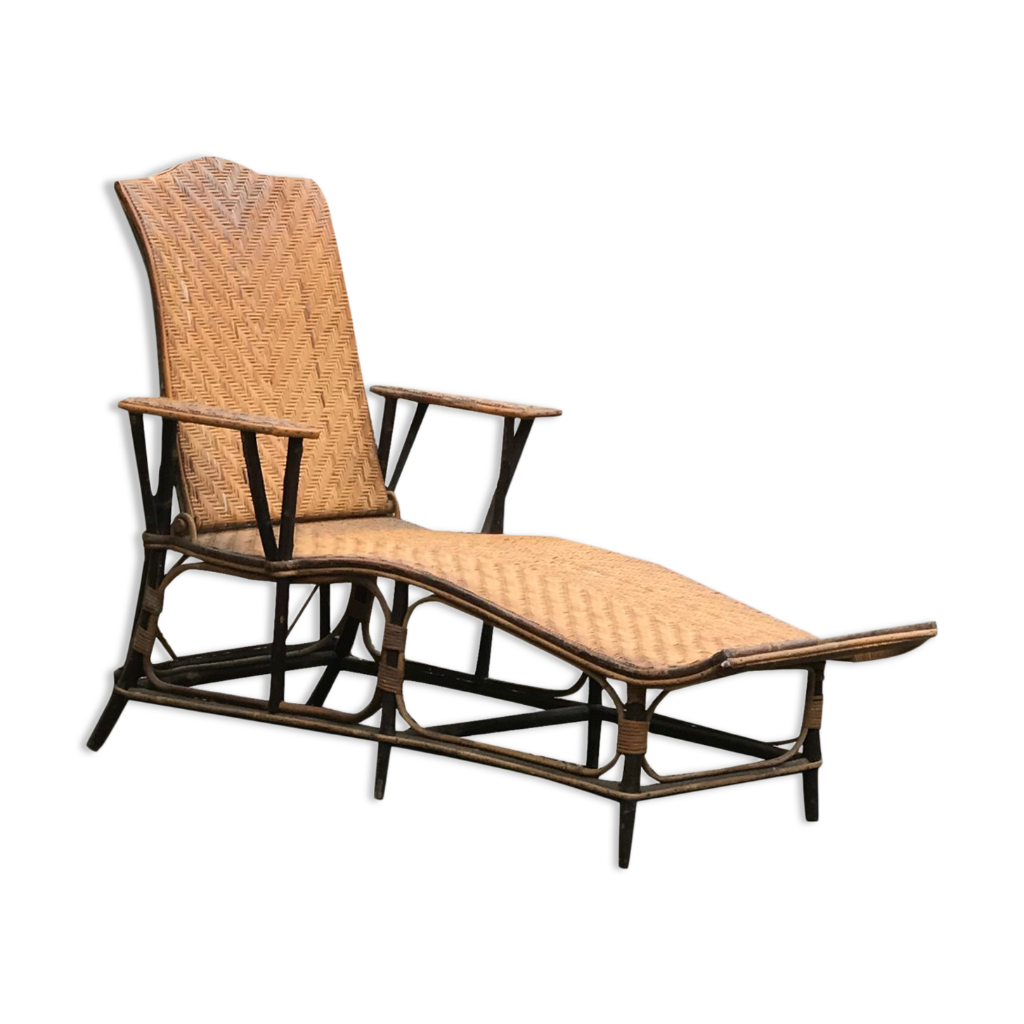 Old rattan lounger.