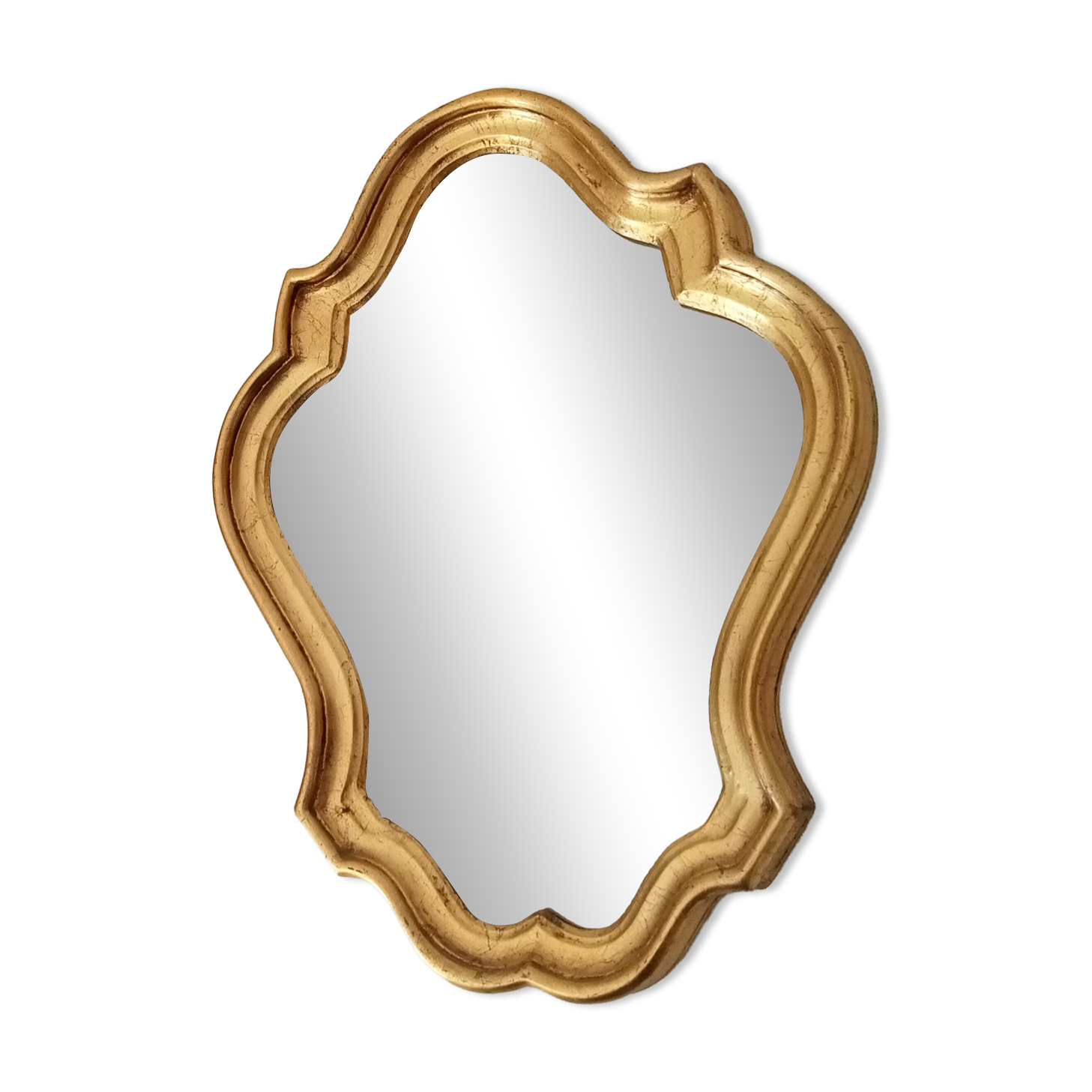 Baroque mirror in gilded wood from the 1960s.