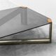 Vintage smoked glass and brass coffee table, 1970s modernism