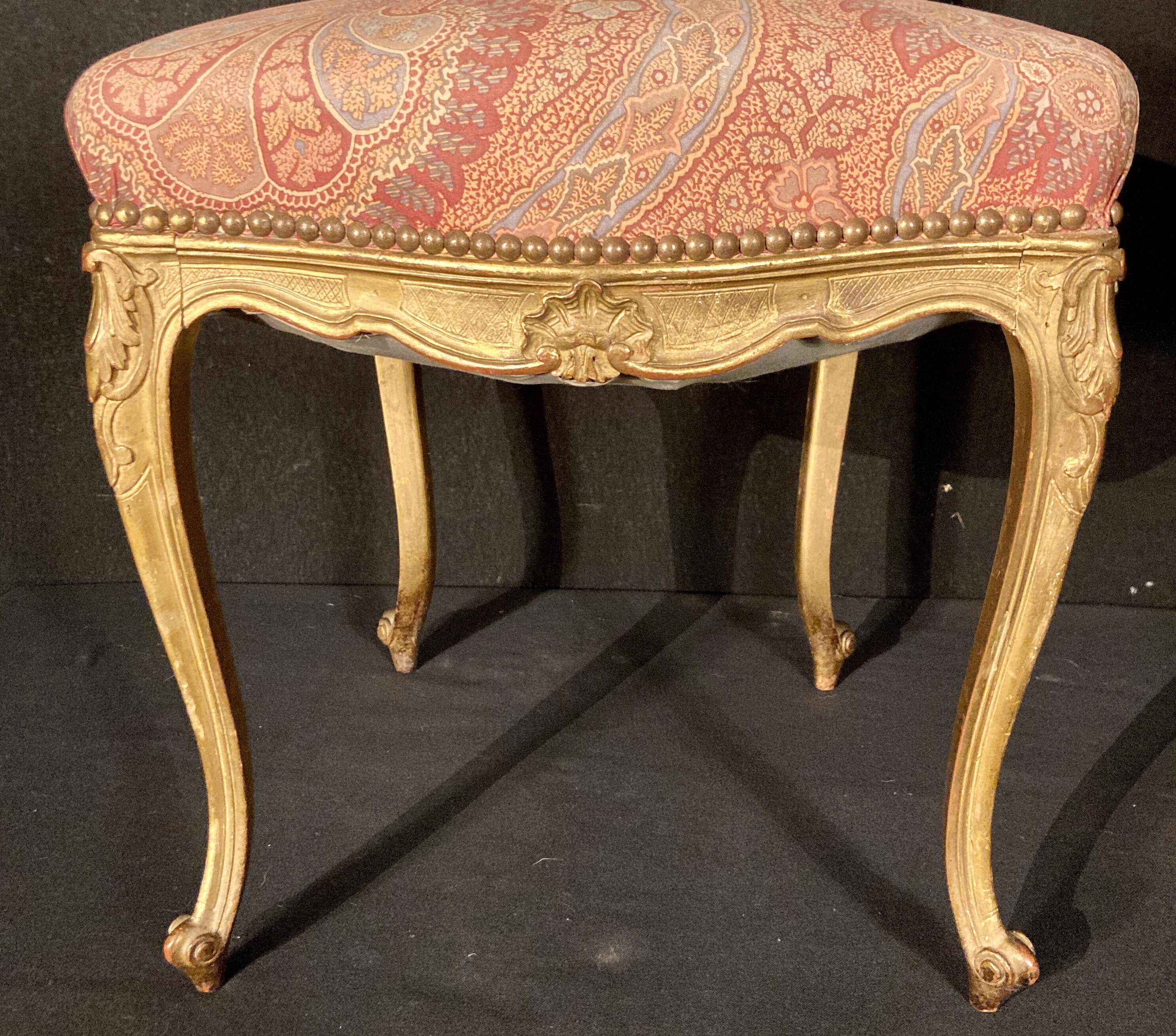 Pair of gilded wooden chairs