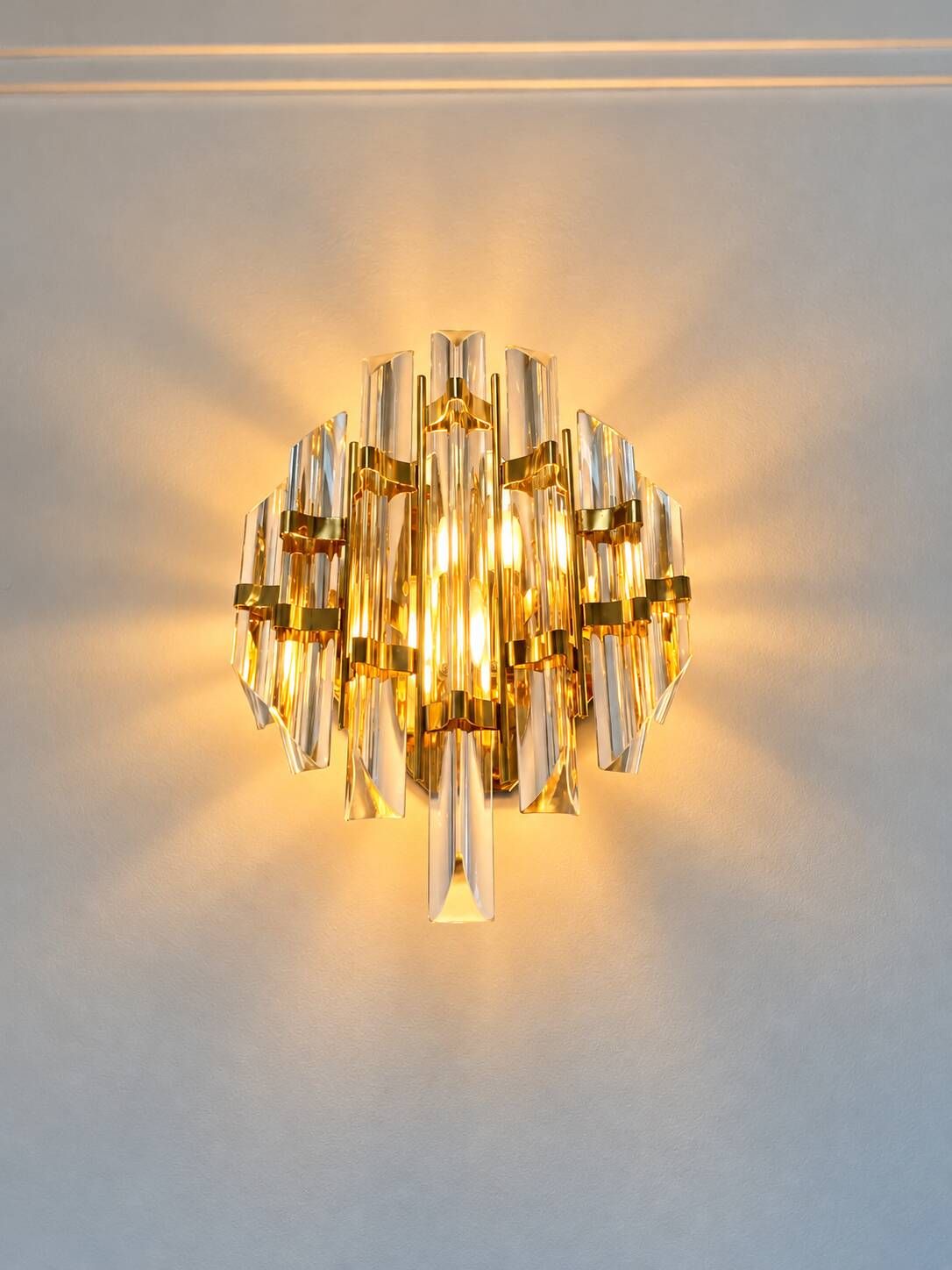Pair of Venini wall sconces in cut Murano glass, circa 1970.