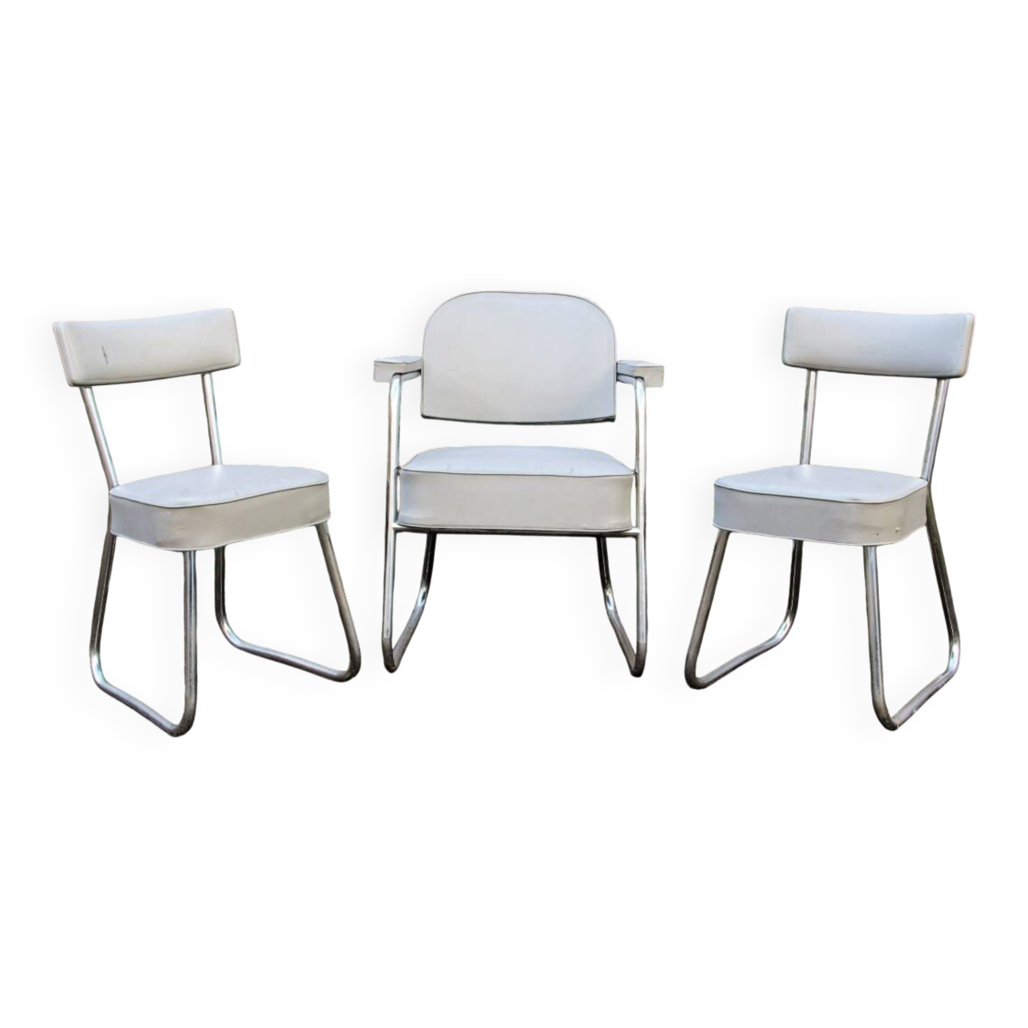Set of 2 chairs and 1 armchair from the 70s in chrome metal and faux leather.