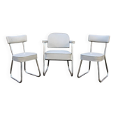 Set of 2 chairs and 1 armchair from the 70s in chrome metal and faux leather.