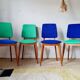 Series of velvet Scandinavian chairs - green and blue.