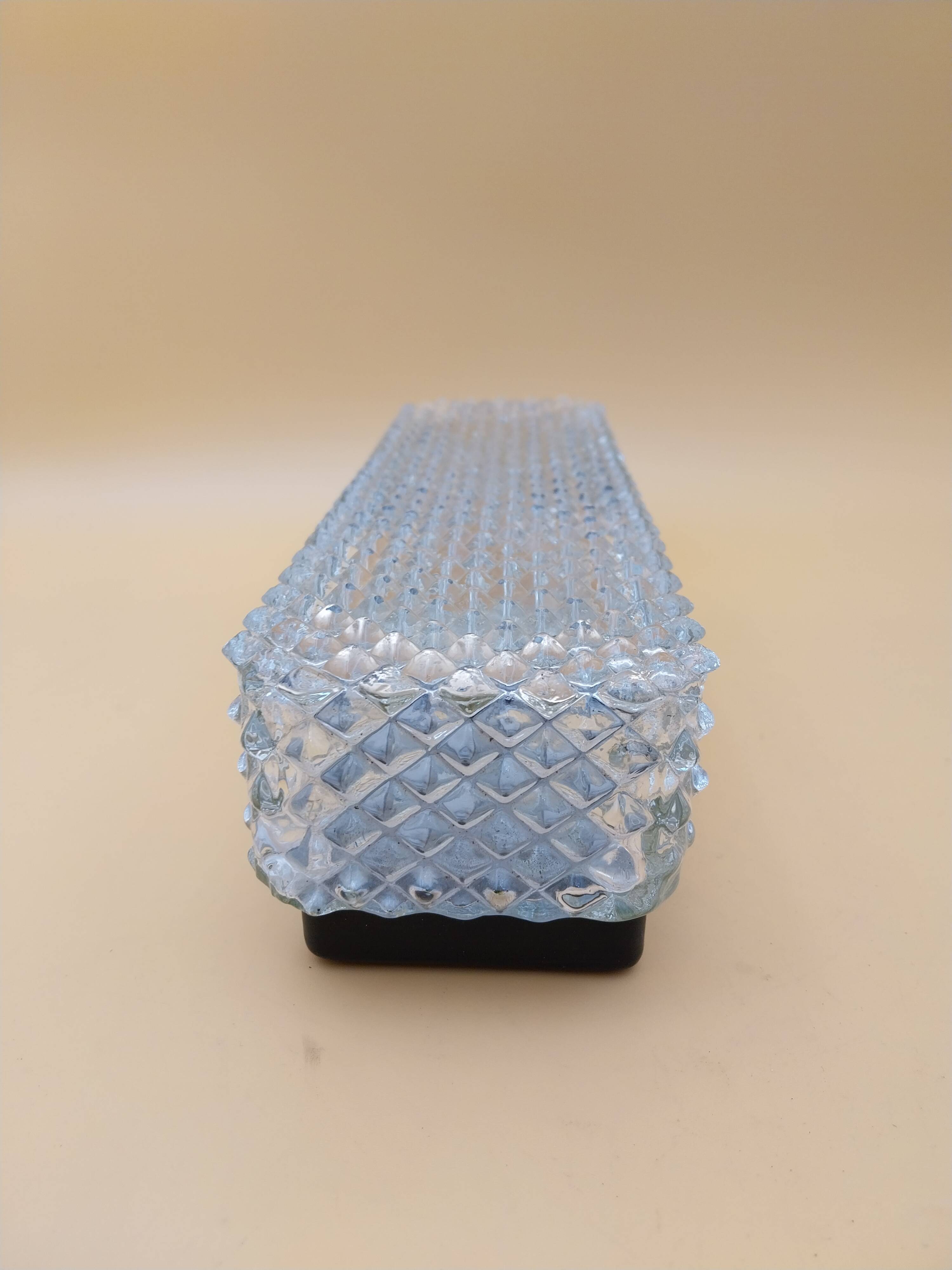 Applique en verre et métal