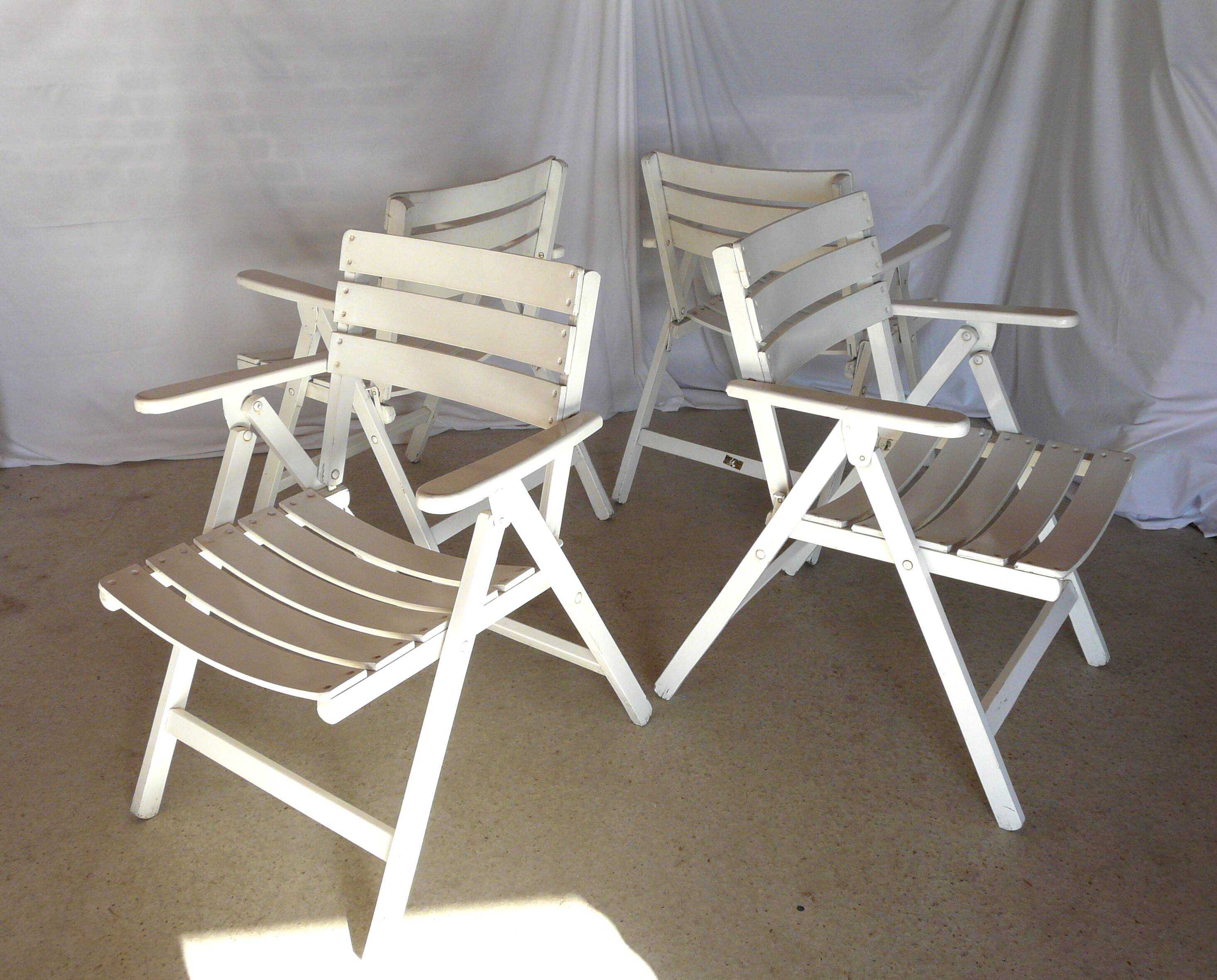 Four vintage wooden garden armchairs from the 1950s